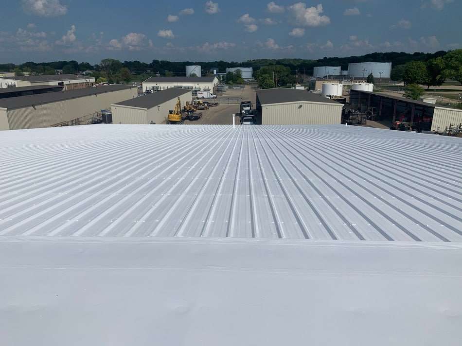 Completed metal roof restoration showing professional results and superior weather resistance